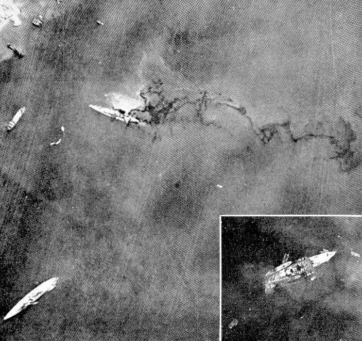 La fotografía tomada por un avión de reconocimiento británico nos muestra el petróleo escapando de los tanques del RMi Conte di Cavour, en la esquina inferior izquierda vemos el indemne RMi Andrea Doria. El recuadro nos muestra el semihundido RMI Littorio